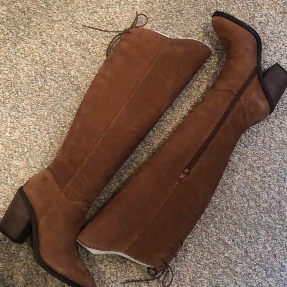 New in box knee high boots